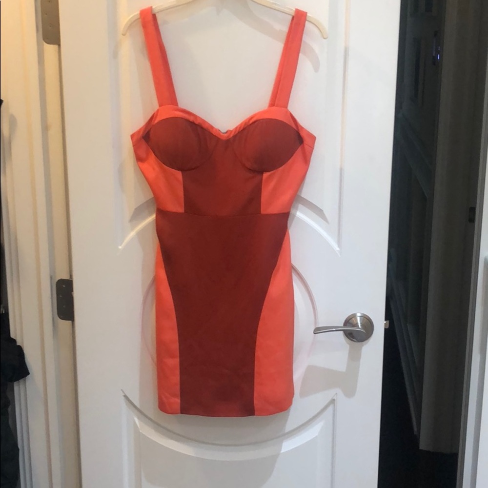 Orange and burnt orange mini sweetheart dress.
